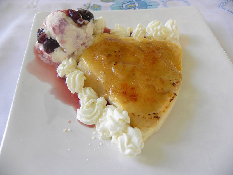 Baked caramelized rice pudding with ice cream image