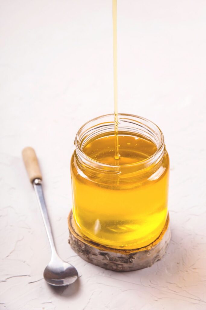 Collage clarified butter in a jar image