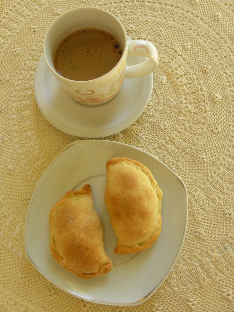 Kolokotes with a cup of coffee picture