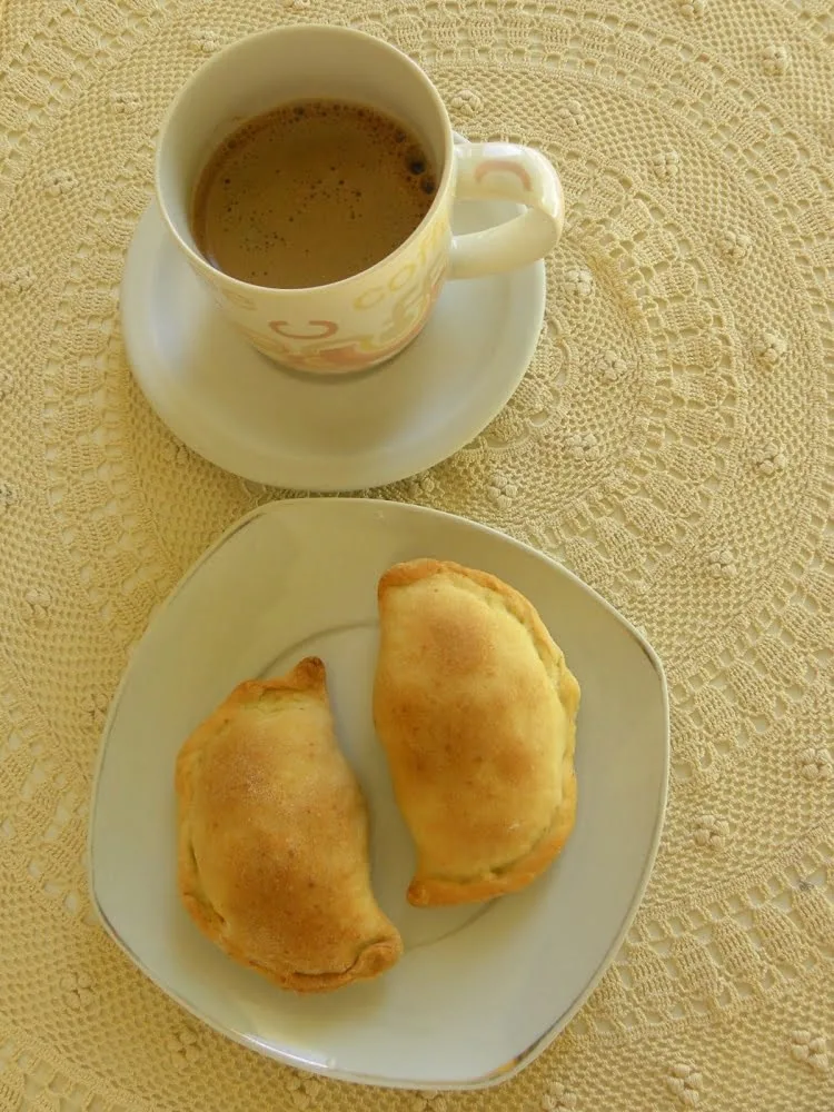 Kolokotes with a cup of coffee picture