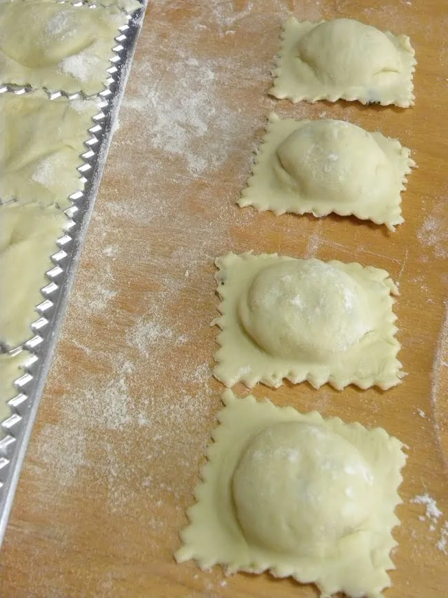 Ravioles cut with ravioli press image