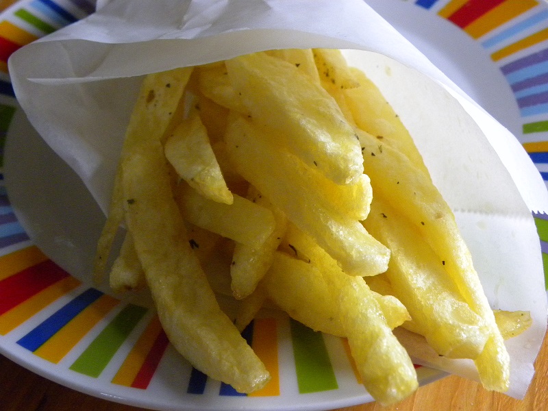 fried potatoes wrapped in paper image