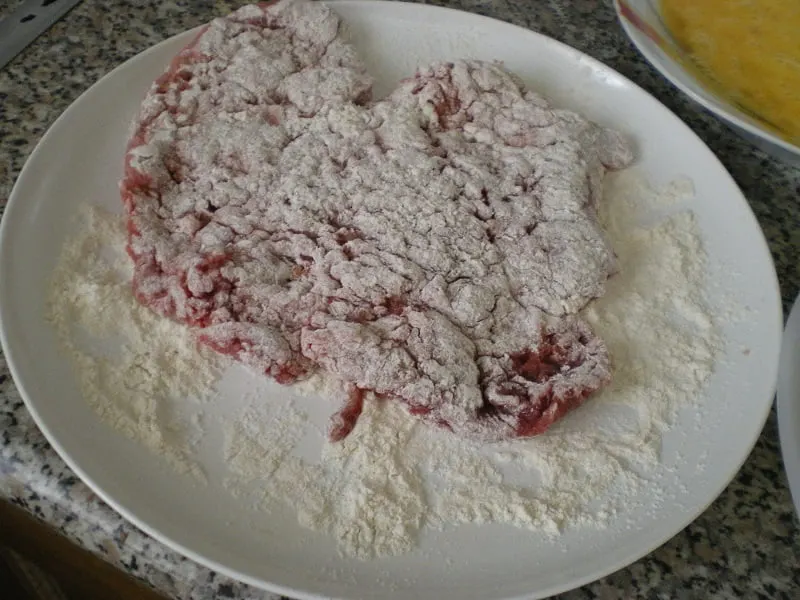 Dipping them in flour image