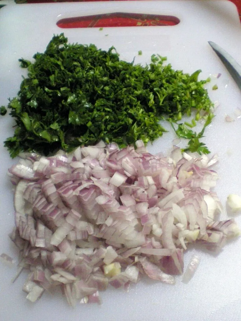 onion and parsley Finely chopped parsley and onion image