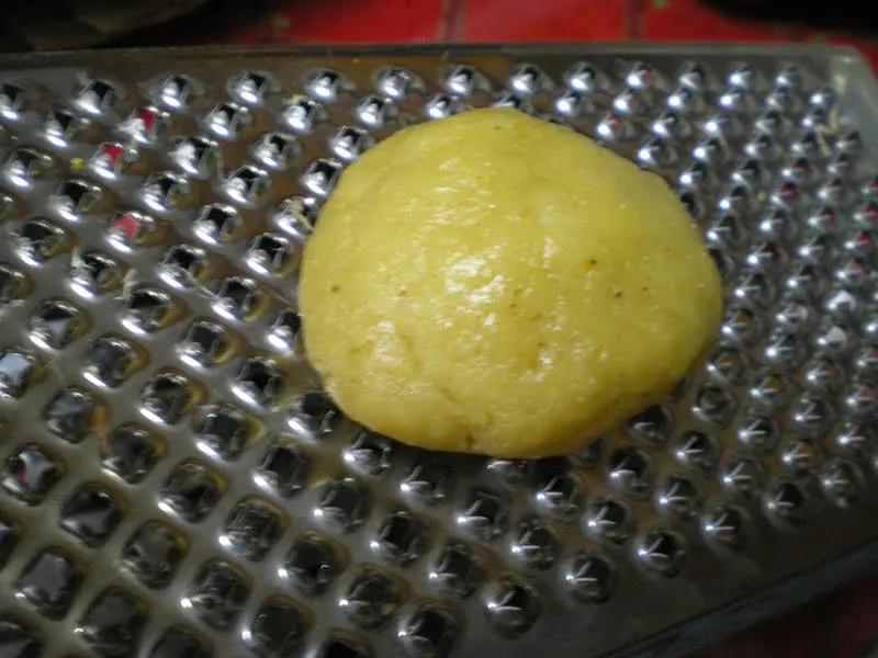 Using a box grater to make patterns on melomakarona image