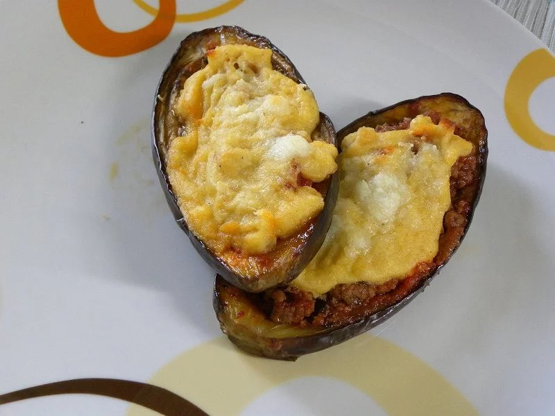 Papoutsakia (stuffed eggplants) with bechamel image