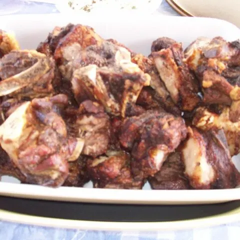 Cypriot souvla or kontosouvli in a platter image