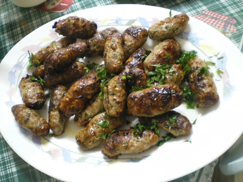 Sheftalia baked in platter image