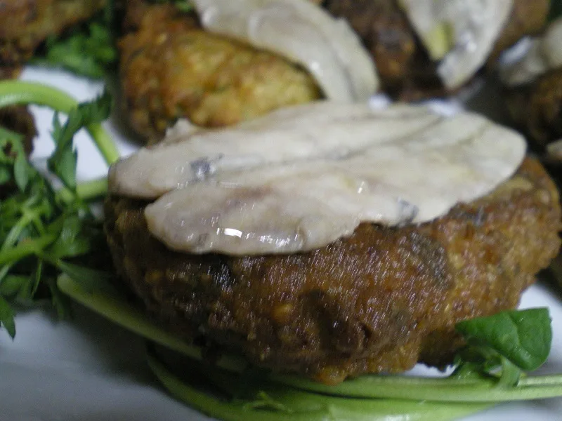 kolokythokeftedes Courgette fritter with a fresh marinated anchovy image