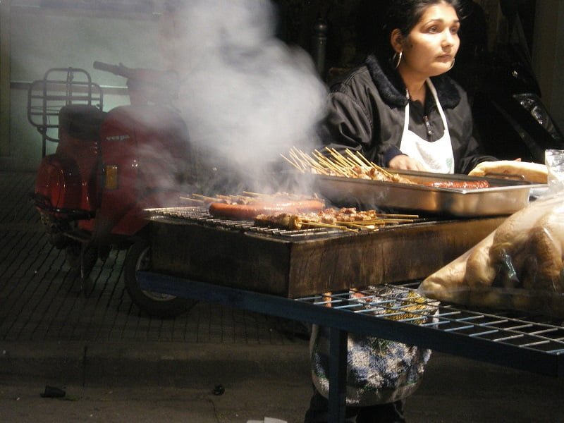 lady selling souvlakia on Tsiknopempti image