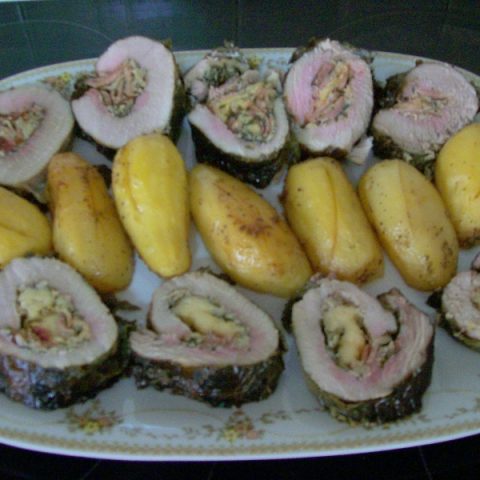 Pork roast with vine leaves image