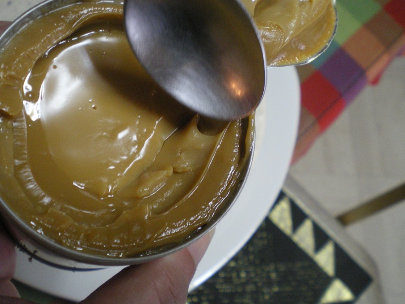 Dulce de leche with a spoon image