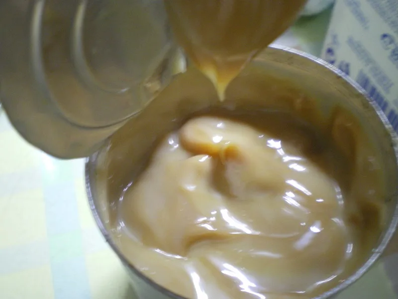 can Opening a can of dulce de leche image