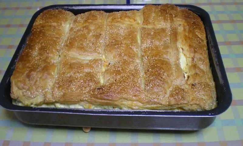 Tyropita with xynomyzithra and puff pastry
