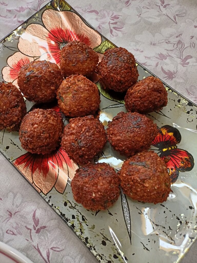 Fried falafel in a colourful plate image