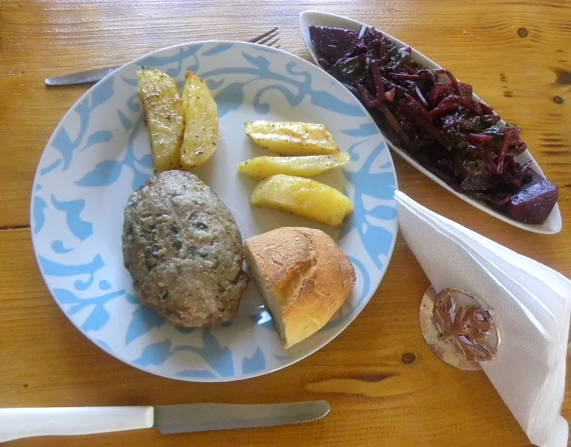 Greek burger with baked potatotes and beet salad image