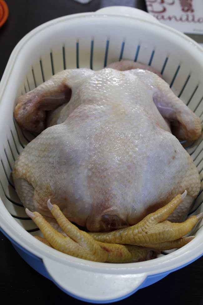 Whole rooster kokoras before cooking