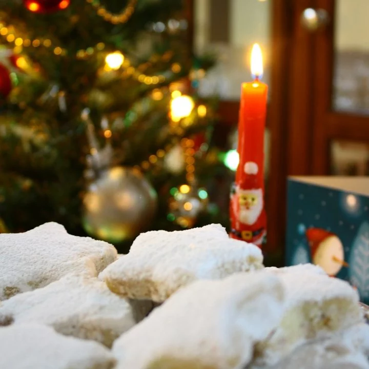 Christmas kourabiedes with candle image