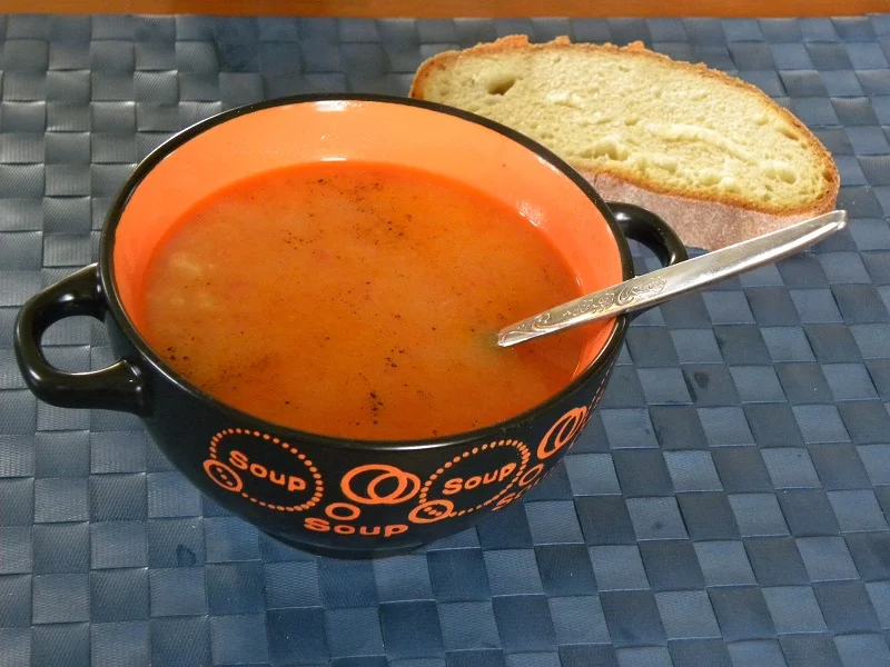 Trahanas with tomato and halloumi image