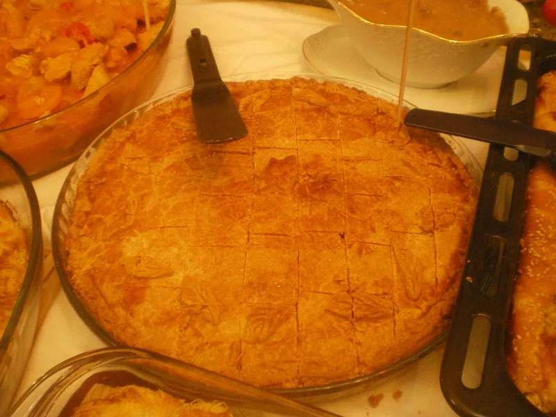 manitaropita-baked-and-cut Manitaropita baked and cut image