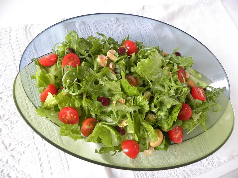 Rocket and lettuce salad Wild Rocket and Lettuce salad with Cashews and Cranberries image