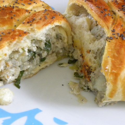 Piroshki with potato baked and cut image