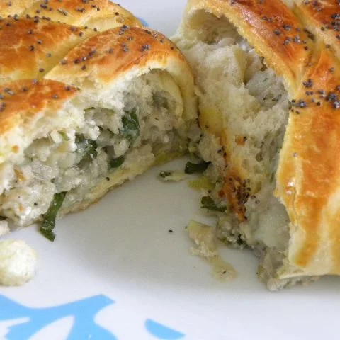 Piroshki with potato baked and cut image
