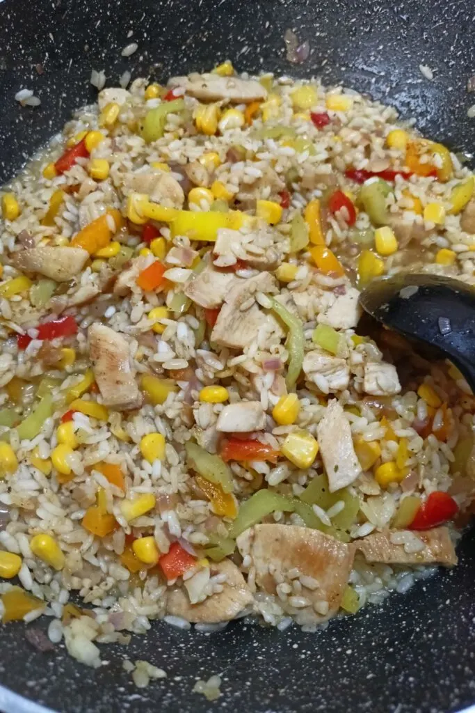 Curry flavoured risotto with peppers and corn image