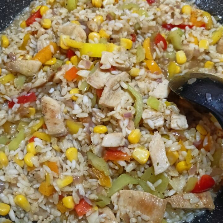 Curry flavoured risotto with peppers and corn image