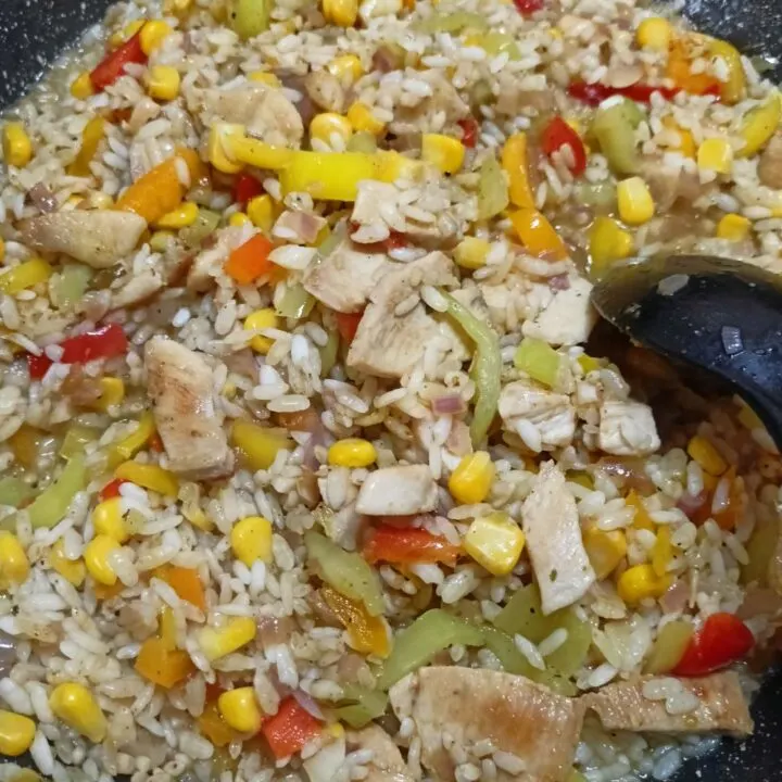 Curry flavoured risotto with peppers and corn image