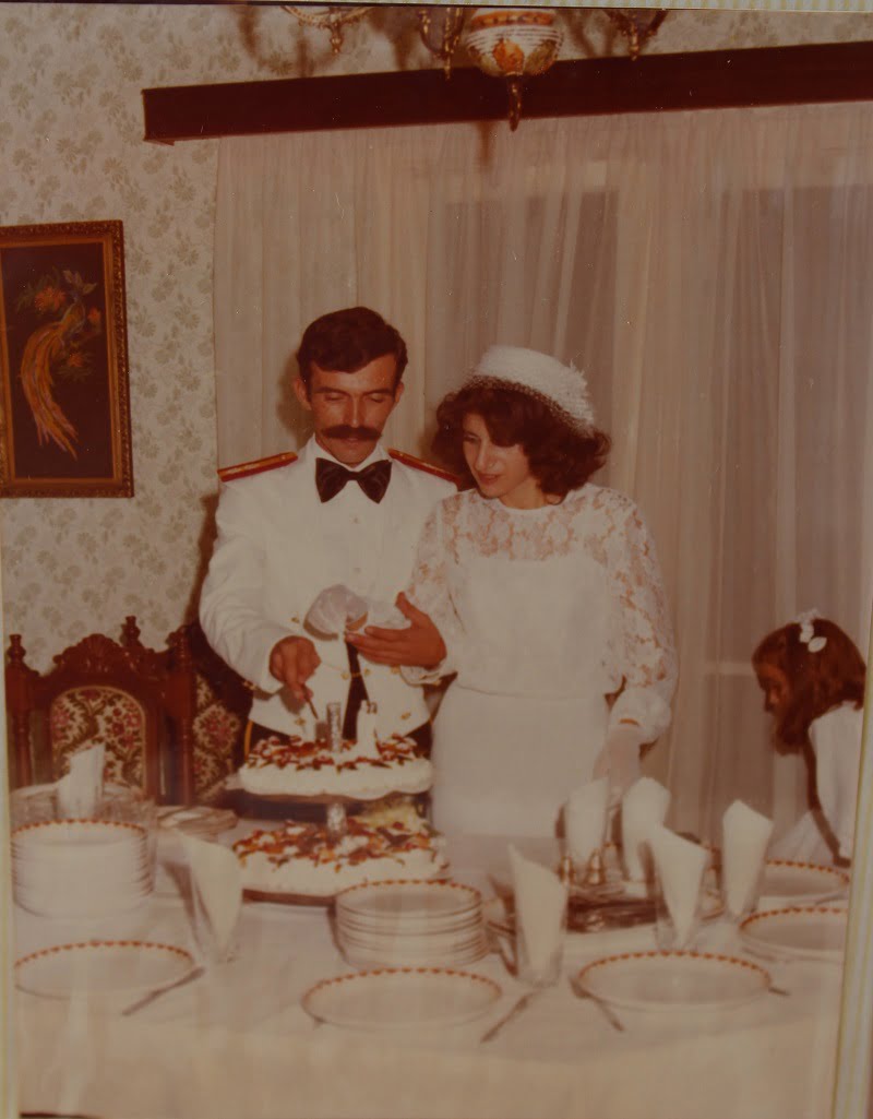 Demetris and I cutting our wedding cake image