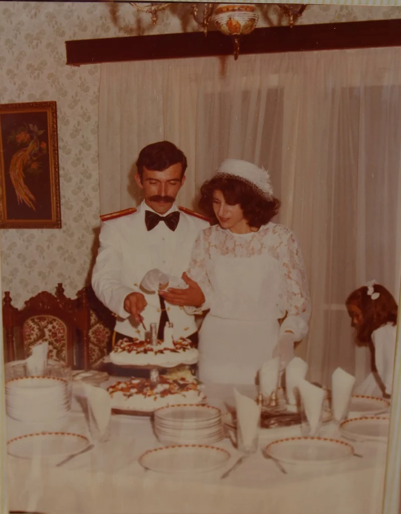 Demetris and I cutting our wedding cake image