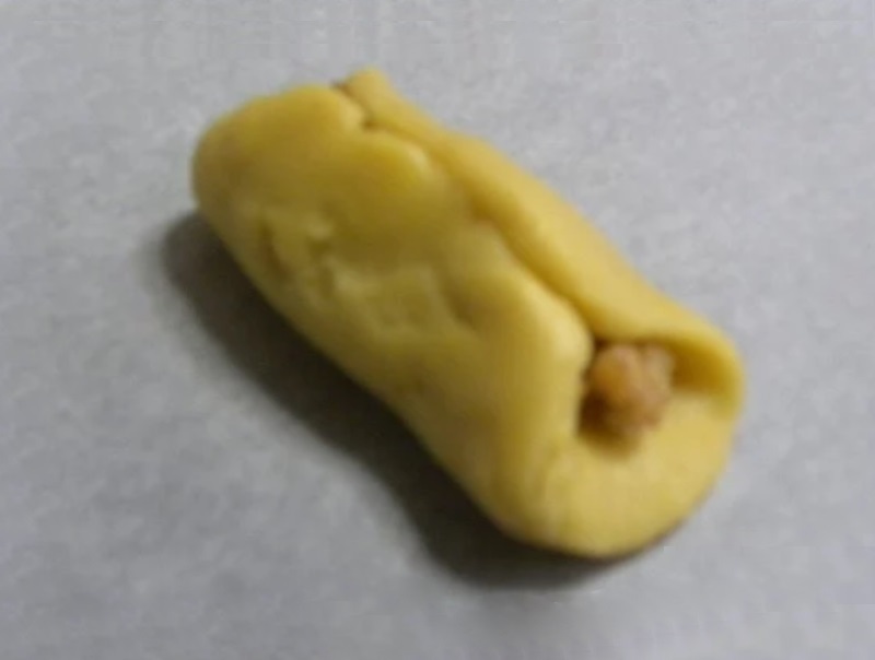 folding the filling in melomakarona image