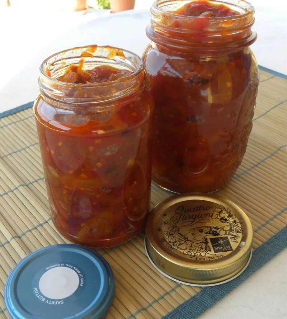 Jars of homemade tomato fruit chutney image