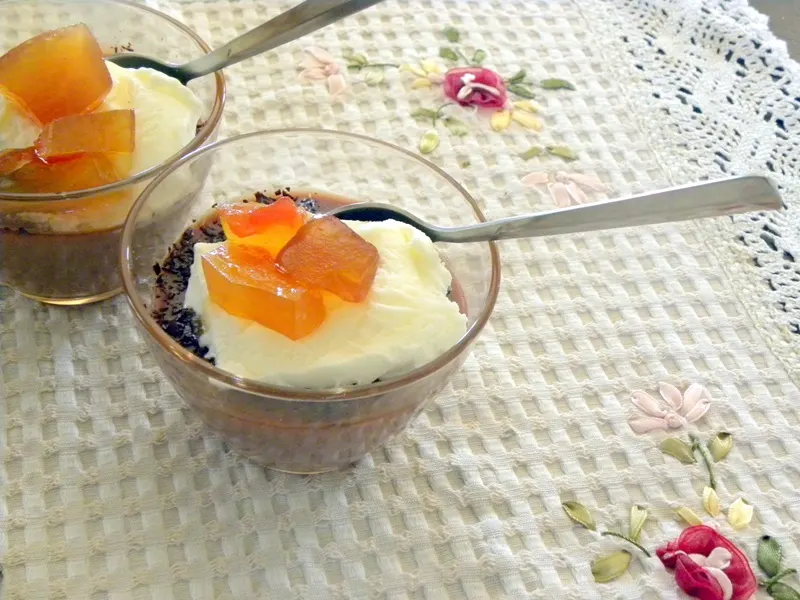 Chocolate pudding with Whipped cream and watermelon preserve image