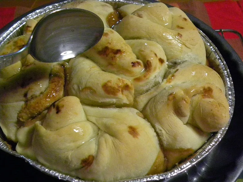 Adding syrup on tahini rolls image