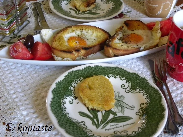 Brunch bread eggs tomatos olives feta