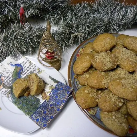 Melomakarona stuffed with white chocolate raspberry jam and walnuts image