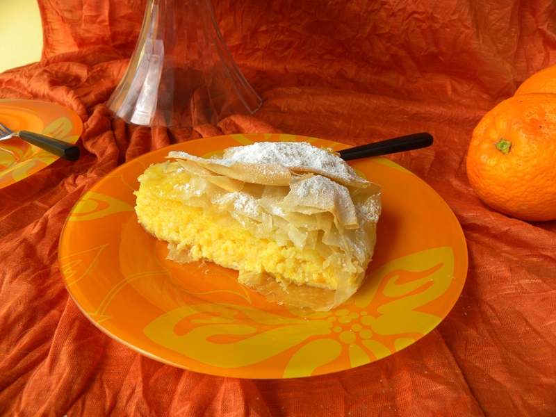 Portokalopita orange phyllo pie cut image