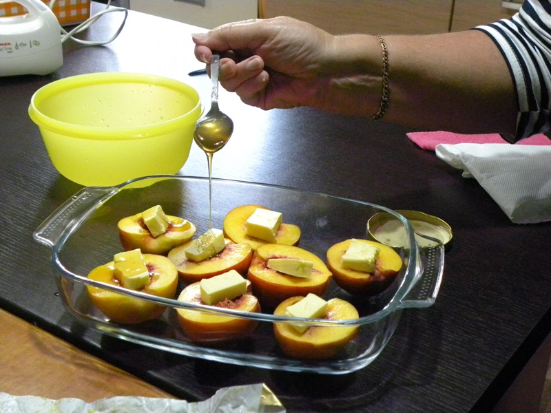 Preparing the peaches before baking image