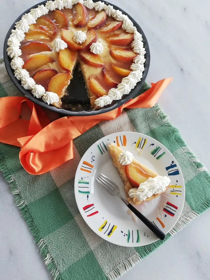 Peach Tarte Tatin with whipped cream photo