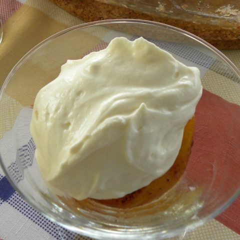 Baked peaches with vegan coconut whipped cream image