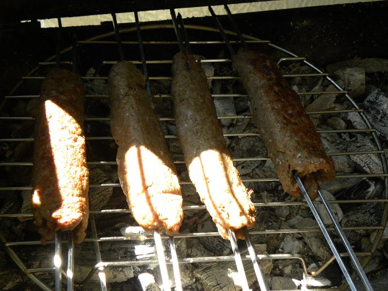kebab on two metallic skewers image