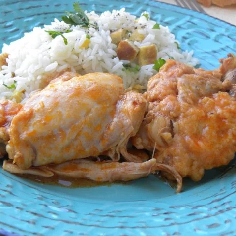 Kotopoulo kokkinisto stewed chicken and pilaf with omelet picture