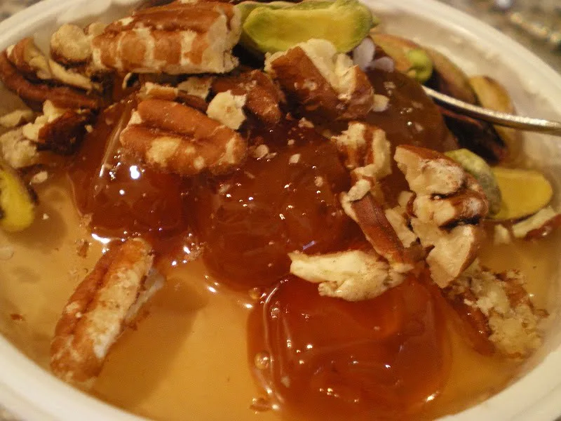 Yoghurt with nuts and cherries image