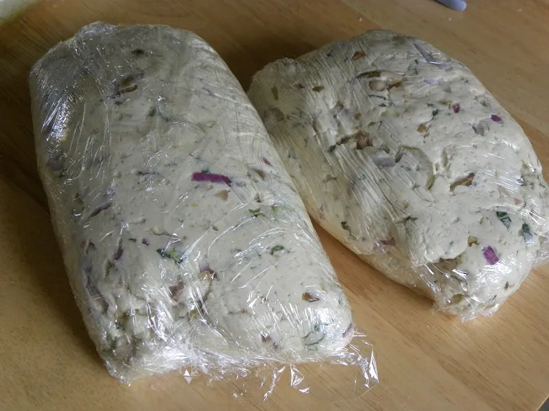 Dough with olives divided image