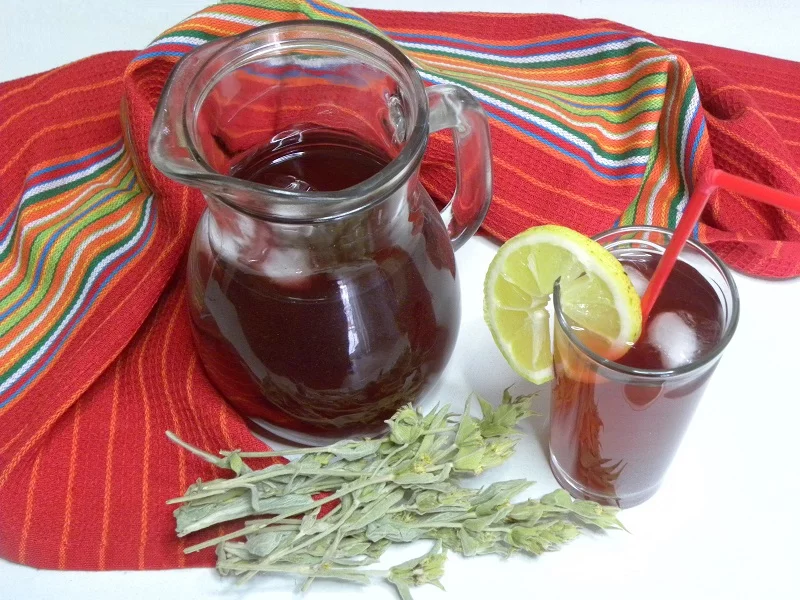 A jar and glass with tsai tou vounou image