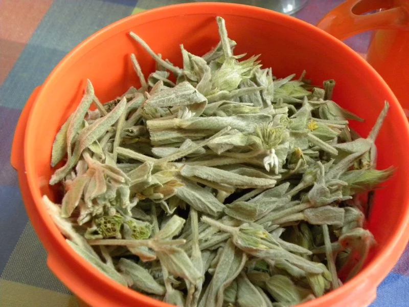 Mountain tea in an orange container image