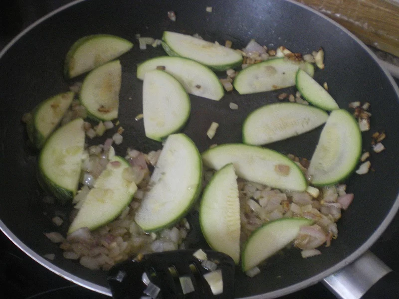Sautéing zucchini image