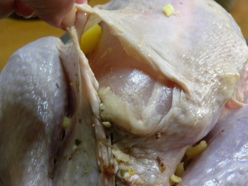 Adding butter under the skin image